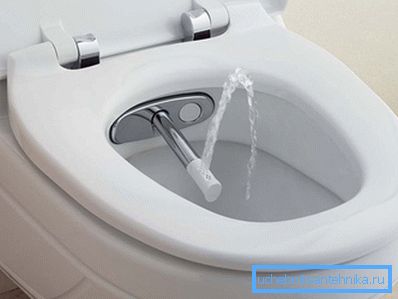 WC, jossa on integroitu suihku WC, jossa on integroitu suihku